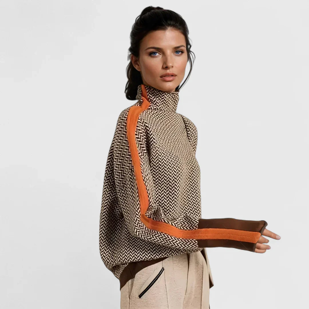 Αριστονίκη - Πουλόβερ με ψηλό γιακά και κομψές αντιθέσεις ρηγών